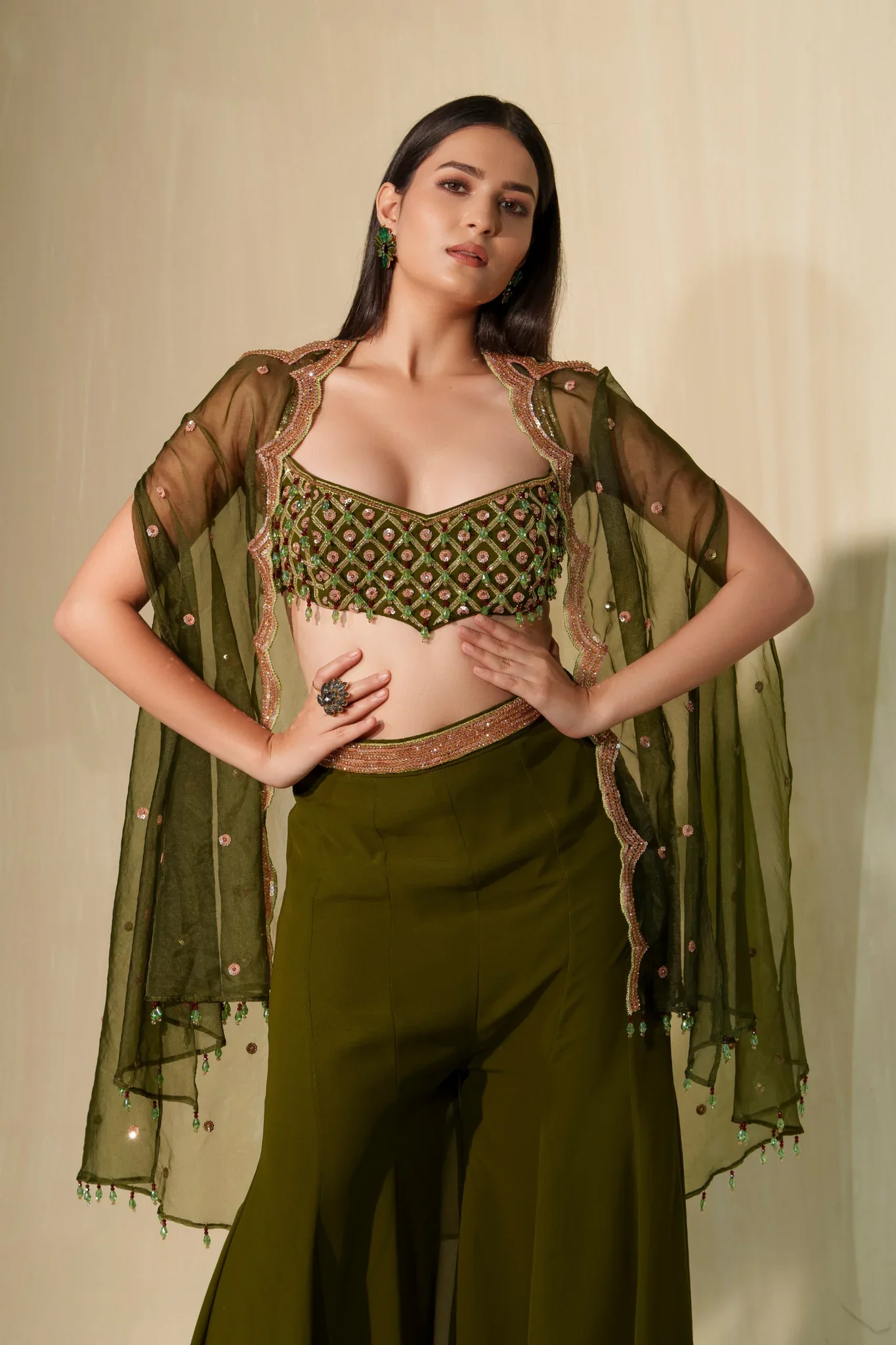 Dark Olive Green Crystal And Sequin Blouse Paired With Flared Pants And Cape - Image 3
