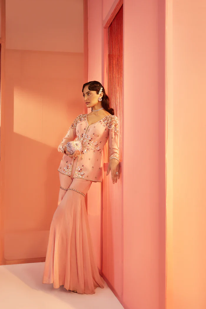 Dusty pink peplum and flared pants - Image 2