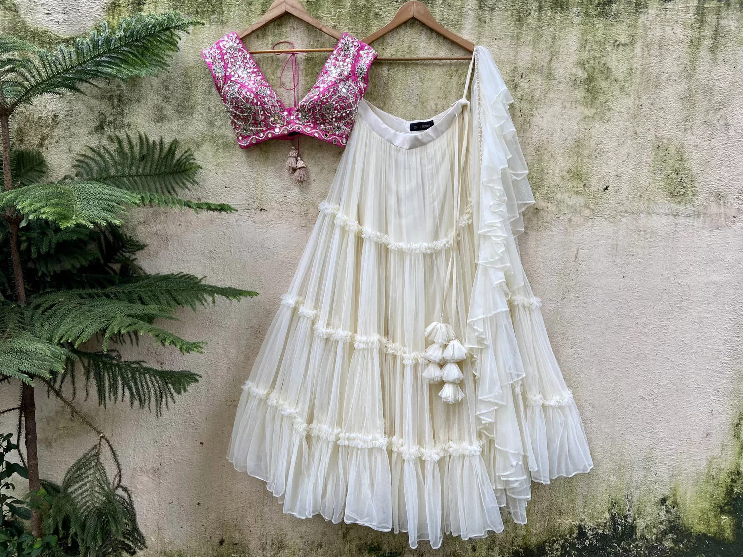 Ivory and Fuchsia Tier and Ruffle Lehenga Set