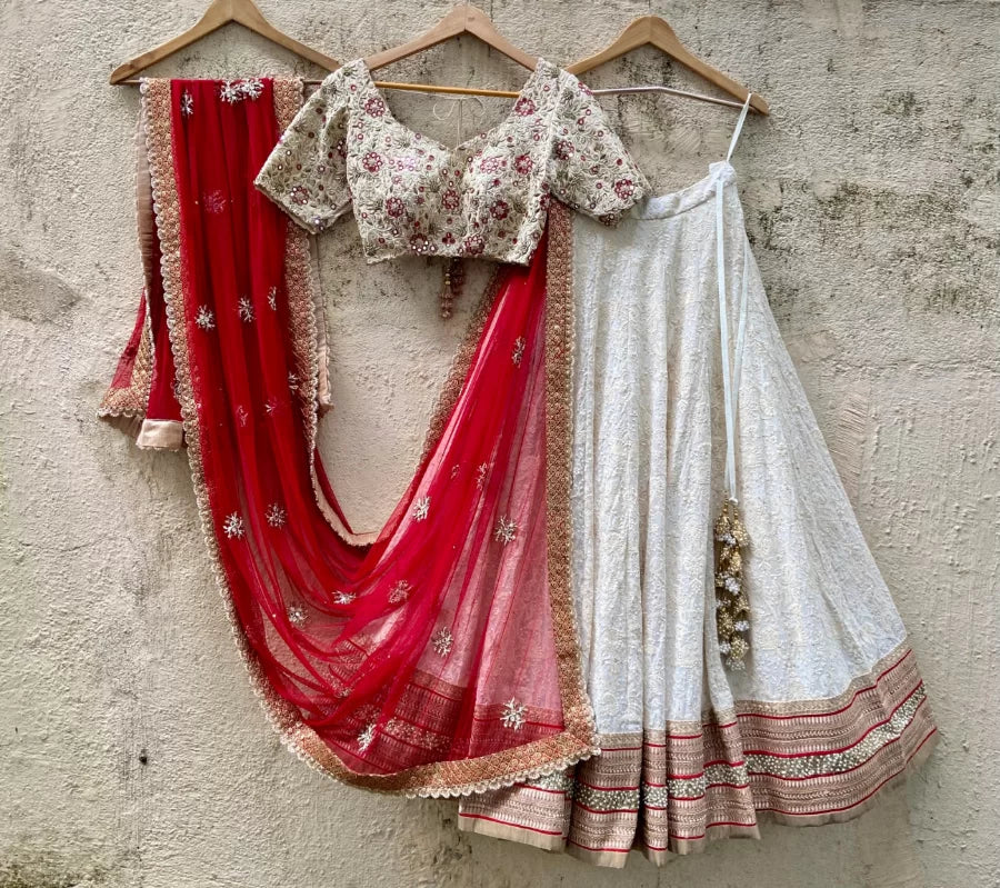 Ivory And Red Bridal Thread And Mirror Work Lehenga Set