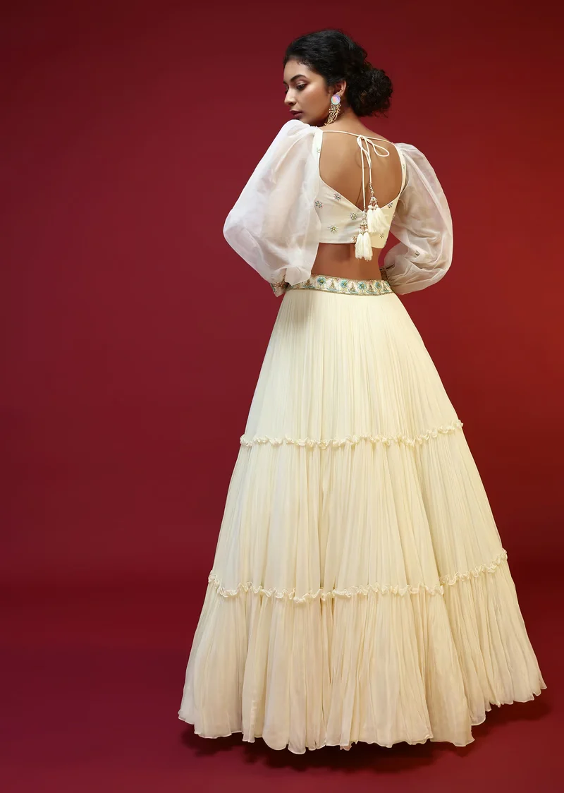 Powder White Lehenga Choli With Elaborate Balloon Sleeves And Multi Colored Hand Embroidered Buttis - Image 3