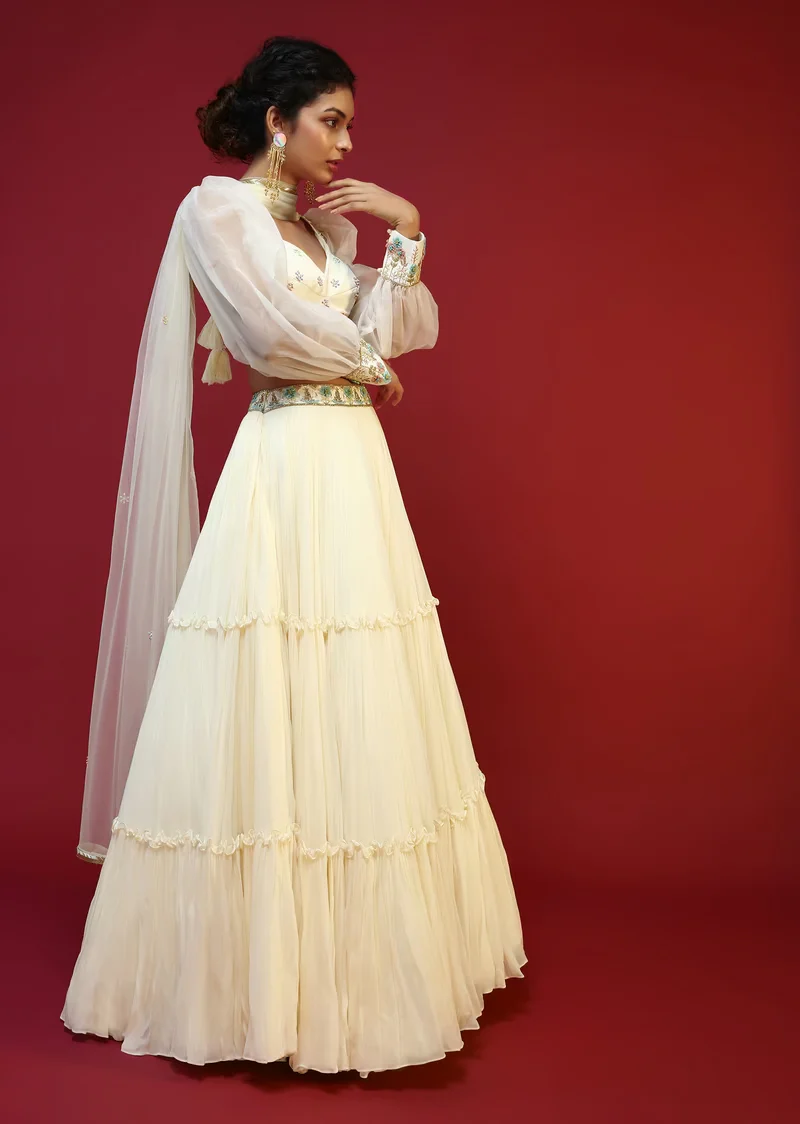 Powder White Lehenga Choli With Elaborate Balloon Sleeves And Multi Colored Hand Embroidered Buttis - Image 4