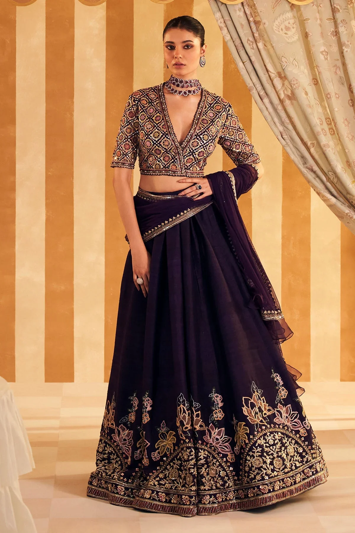 Qaruna - Purple Net Embroidered Blouse and Raw Silk Embroidered Lehenga