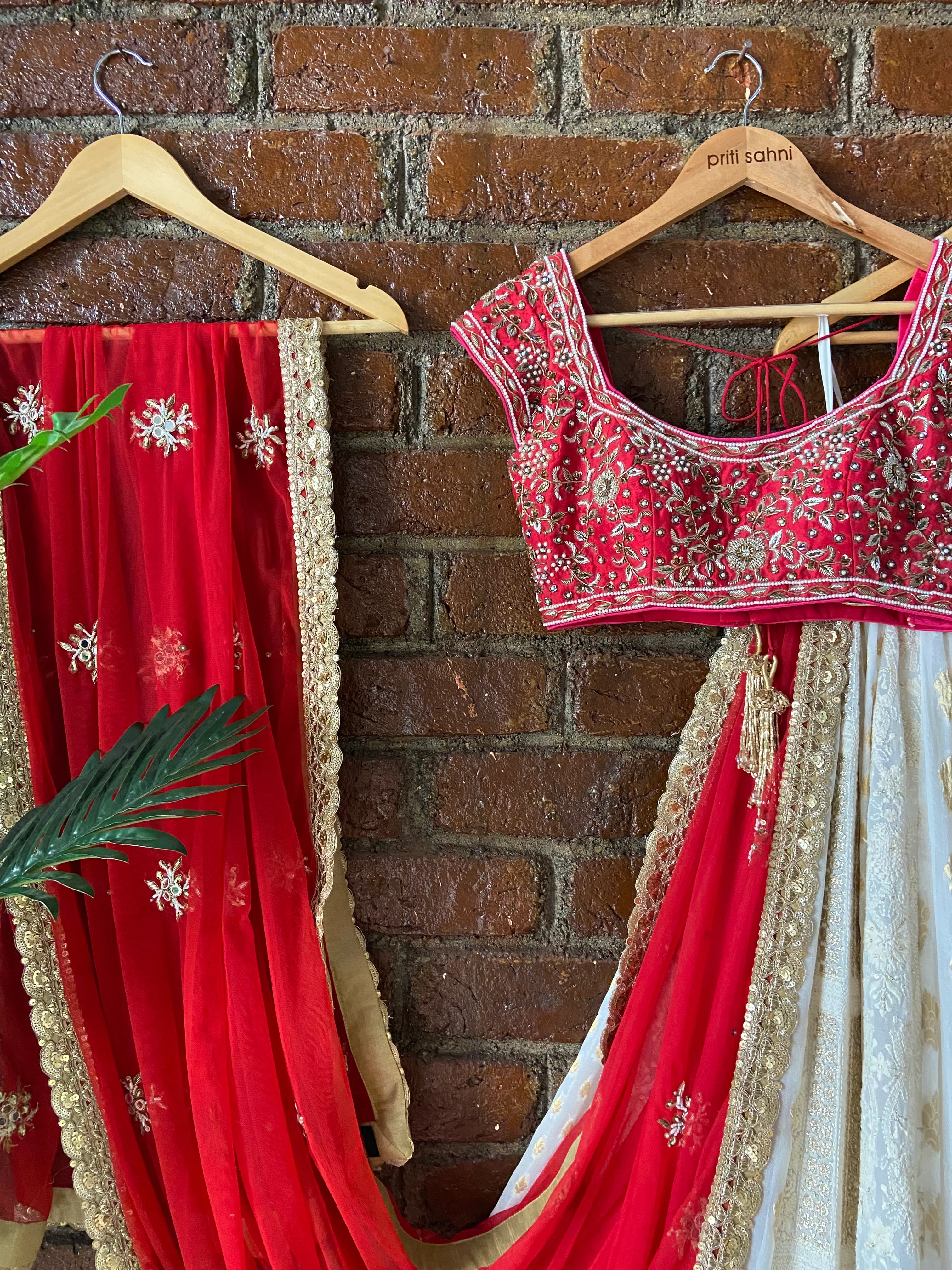 Red And Ivory Multipanel Lehenga Set